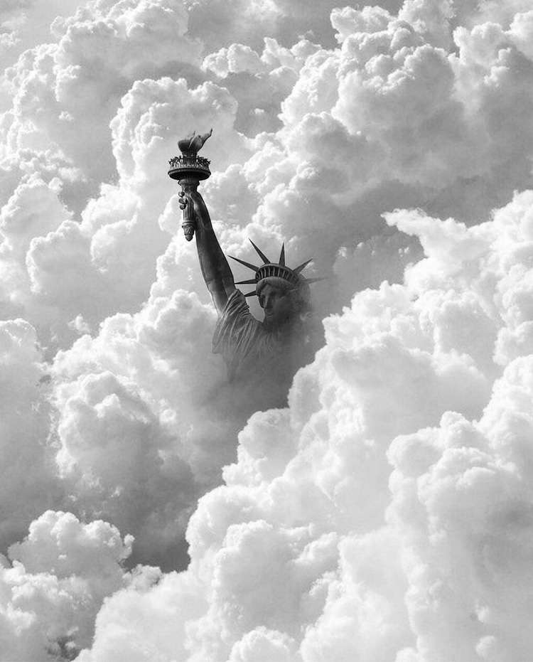 Statue of liberty with clouds
